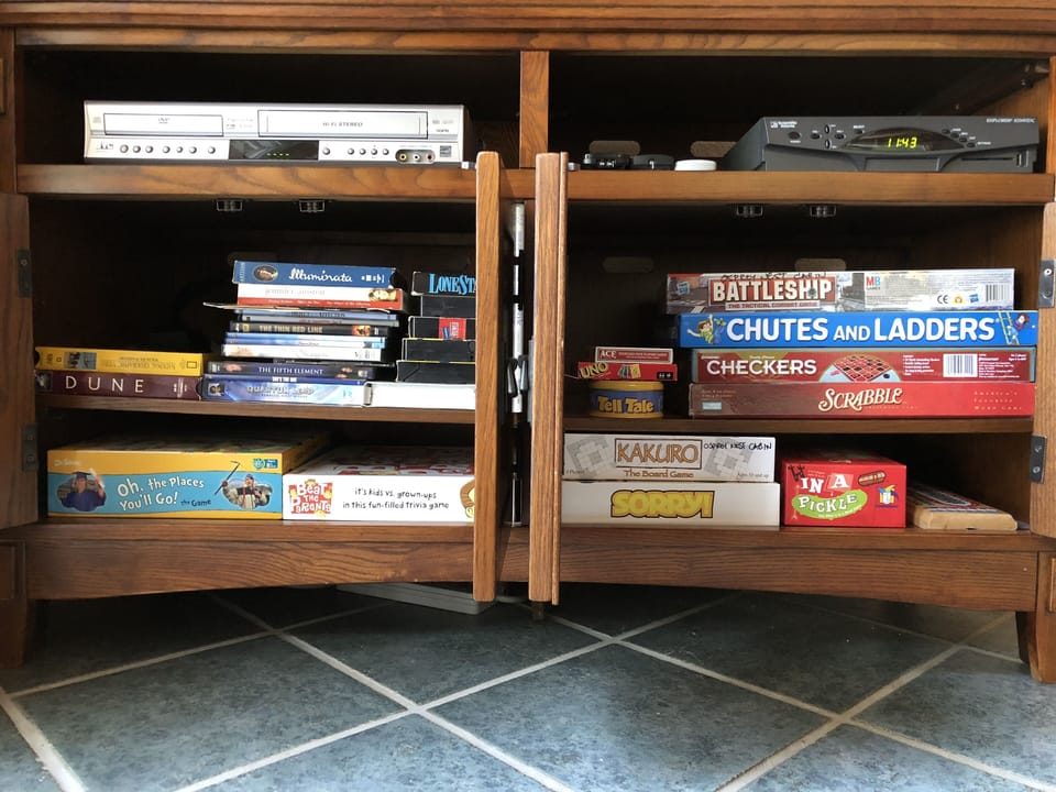 Selection of games in the TV stand. 