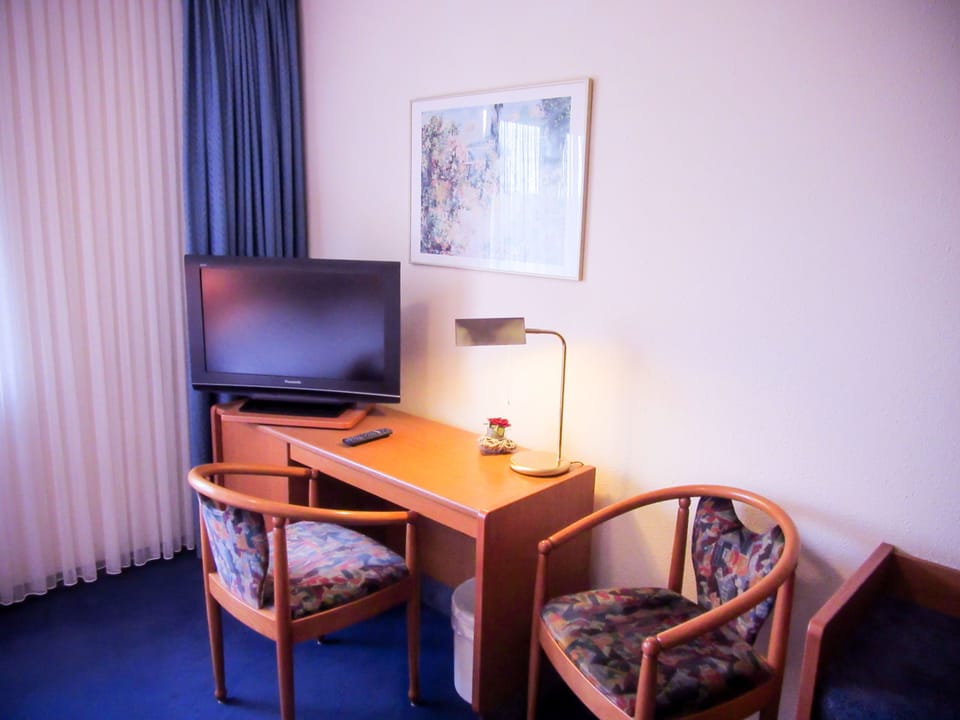Desk, blackout drapes, rollaway beds, free WiFi