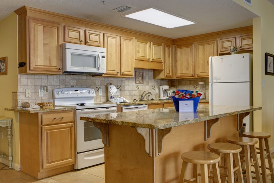 Open kitchen with large granite island