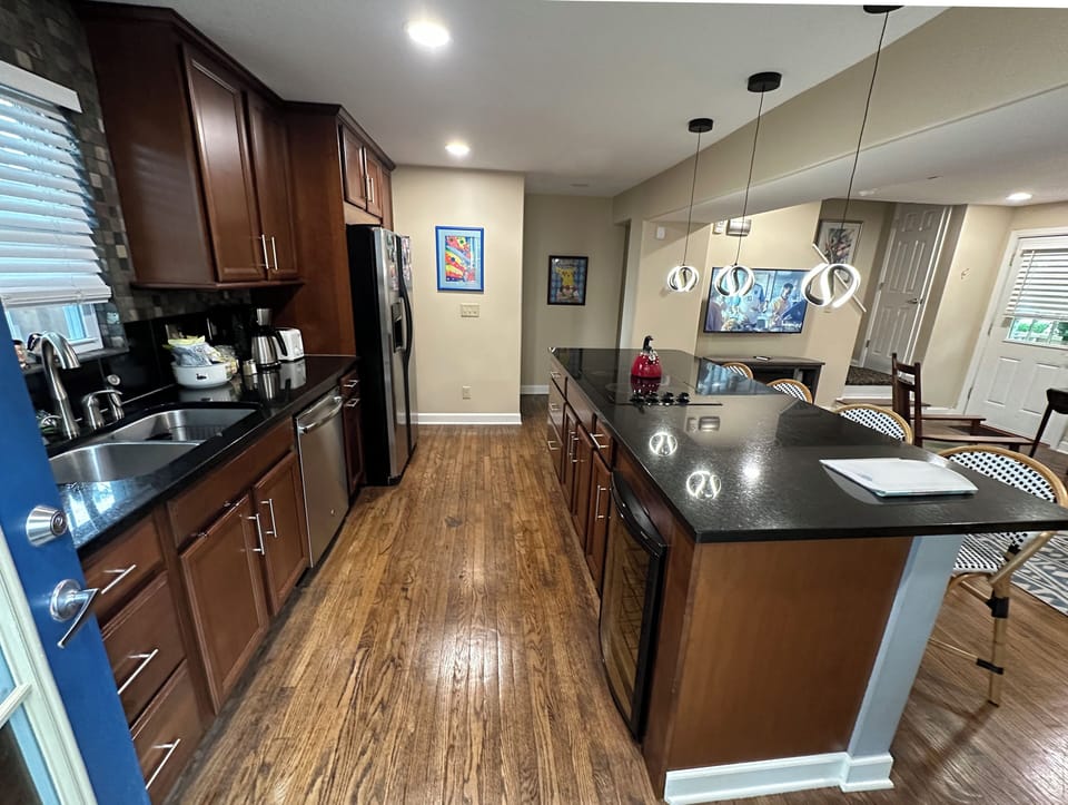 Oven, fridge, microwave, dishwasher, cook top,  65" TV.