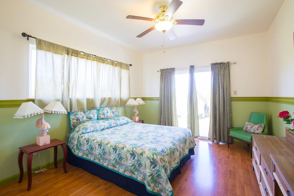 1 of 3 bedrooms 1st floor w/ queen bed