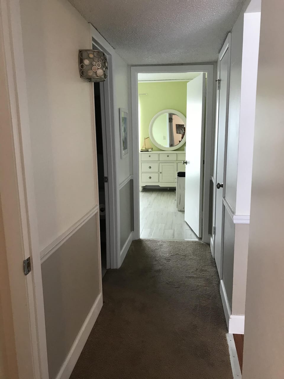 From master entry into Twin guest, 1/2 bath on left