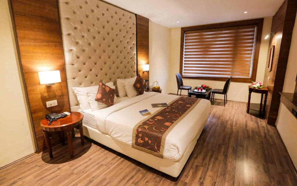 Deluxe Room, 1 Bedroom, City View | Premium bedding, minibar, in-room safe, desk