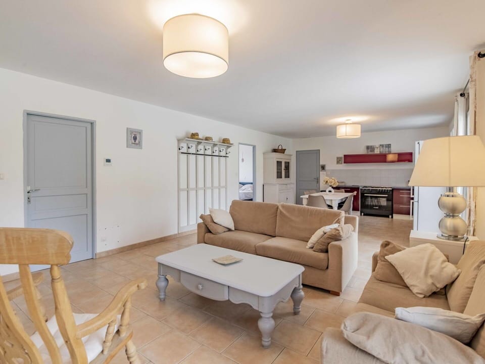 Furniture, Table, Property, Couch, Picture Frame, Interior Design, Beige, Lamp, Flooring, Wood