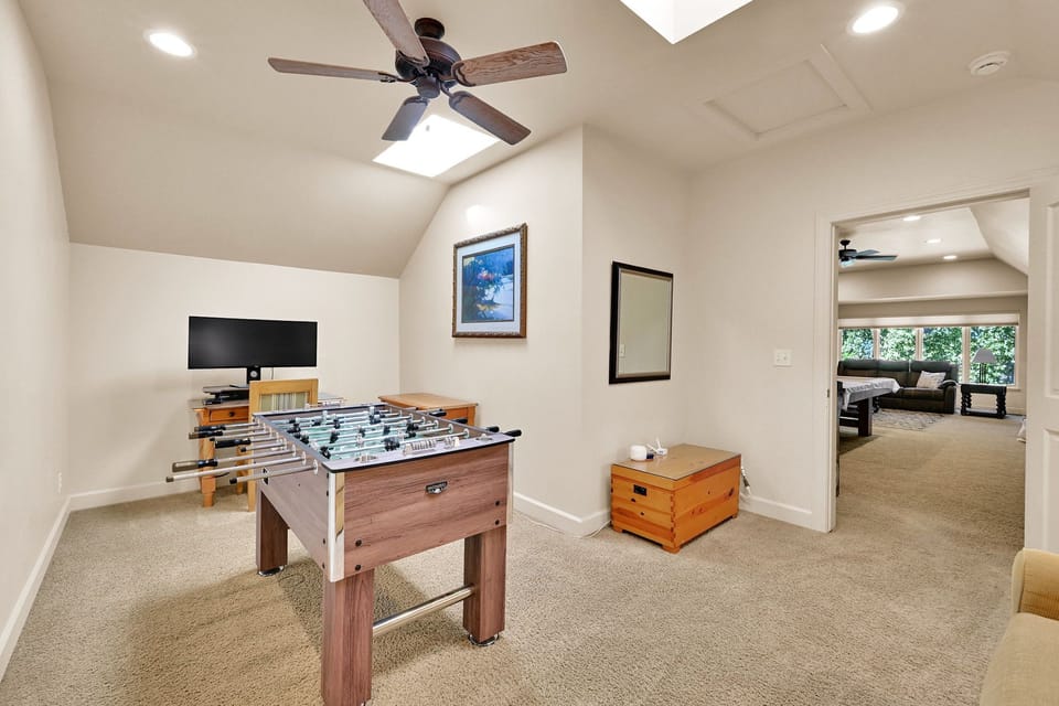 Upstairs den is great for reading, foosball, and even some home office work. 