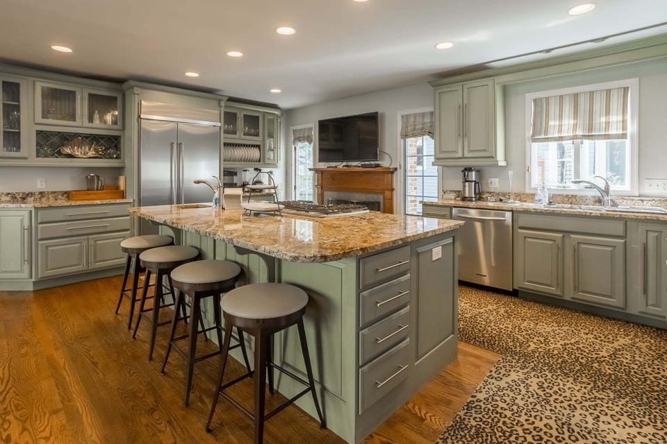 Kitchen area with barstool seating