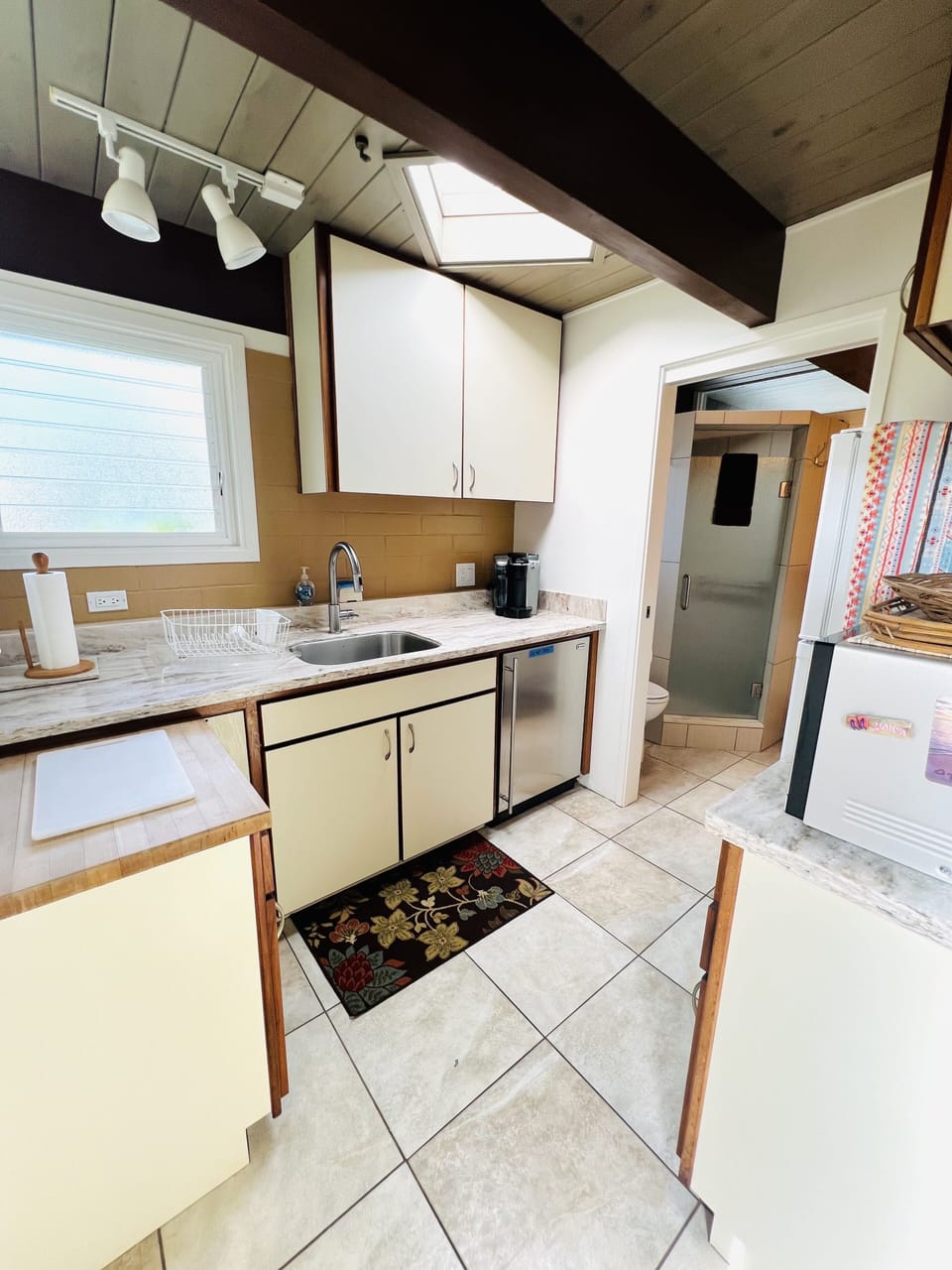 kitchen into bathroom