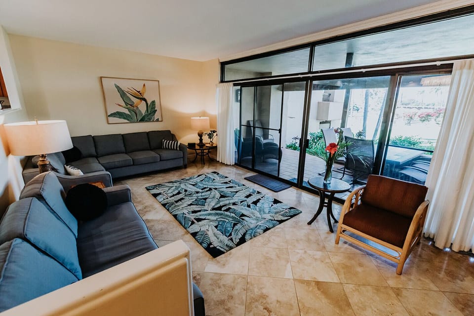 Large sunken living area has flatscreen tv and 2 pullout sofa beds (1)