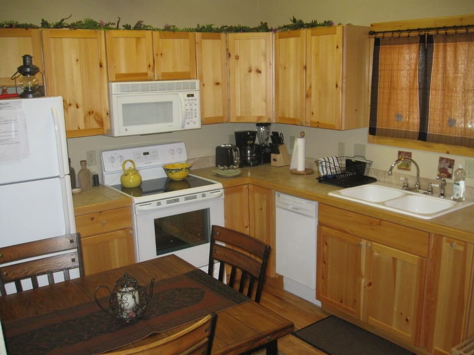 Full kitchen includes dishwasher and oven