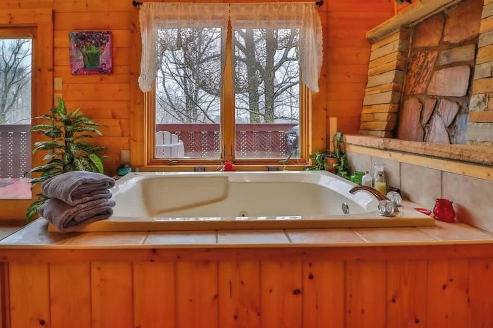 Unwind in the bubbling tub after a day of mountain adventures.
