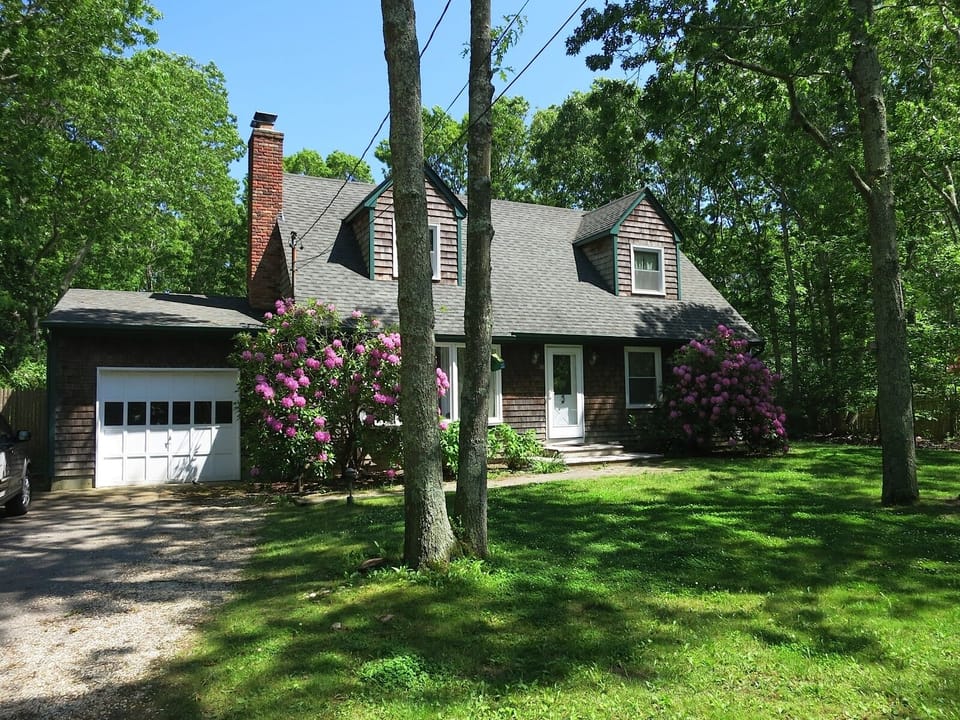 Spacious 4 Bedroom Home with Heated Pool on Private Half Acre