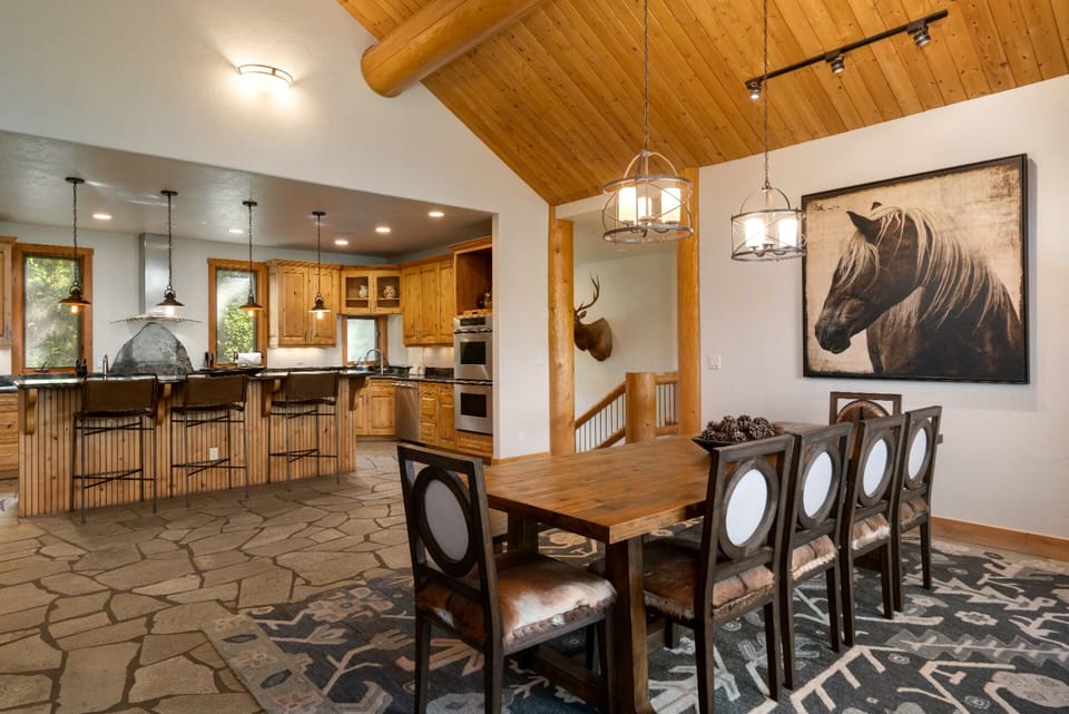 Dining and Kitchen Bar - Cow upholstered chairs & long wood bench