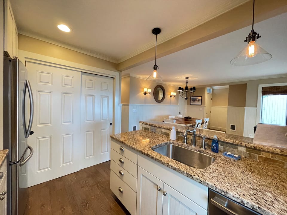Kitchen with dining room and entry