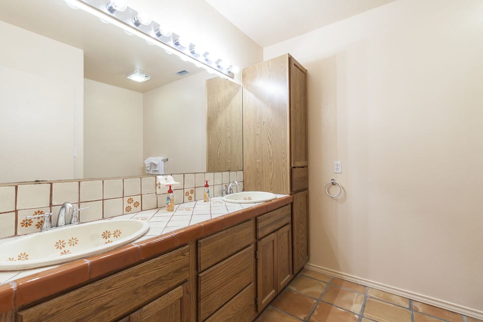 The shared second-floor bathroom is conveniently located near the guest bedrooms.
