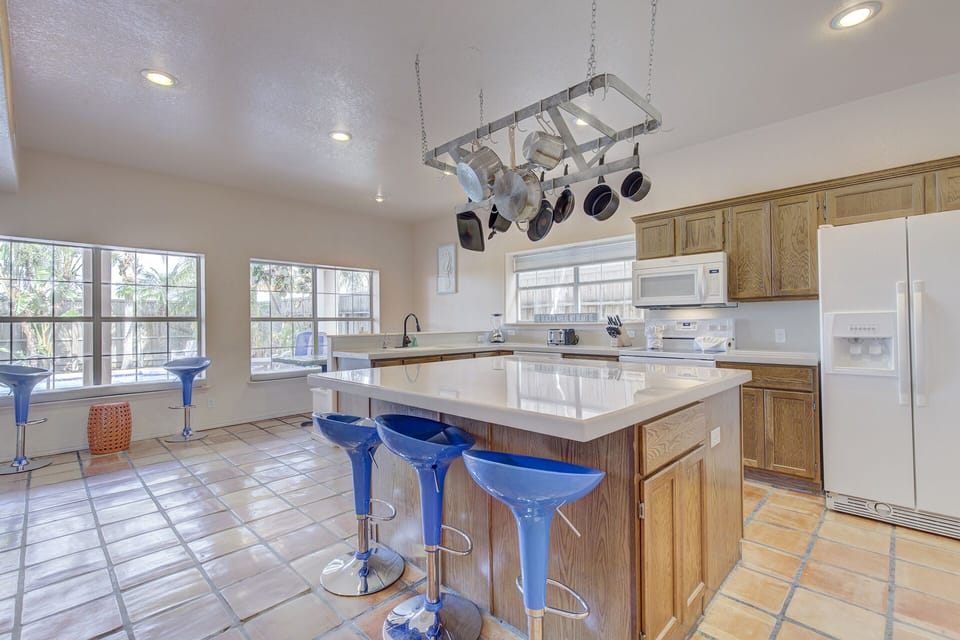 Kitchen and breakfast area with large center island bar