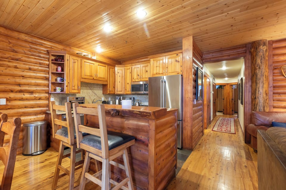 The kitchen w/ breakfast bar will be your casual focal area while serving snacks