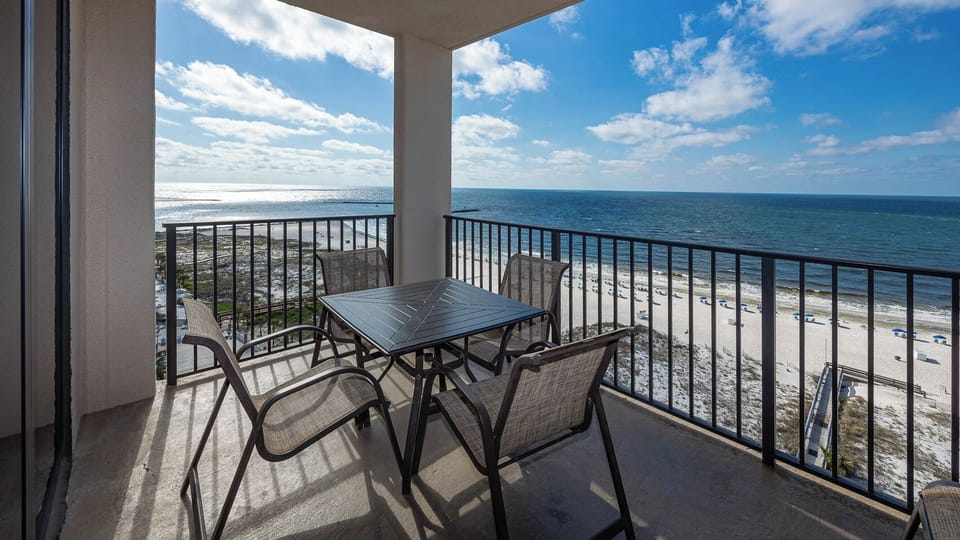 Enjoy meals or drinks at the outdoor table while taking in the expansive views of the tranquil waters and shoreline