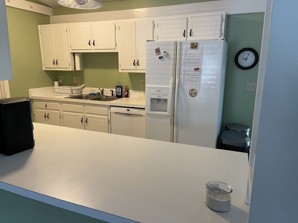 Kitchen is stocked with everything you need for cooking.