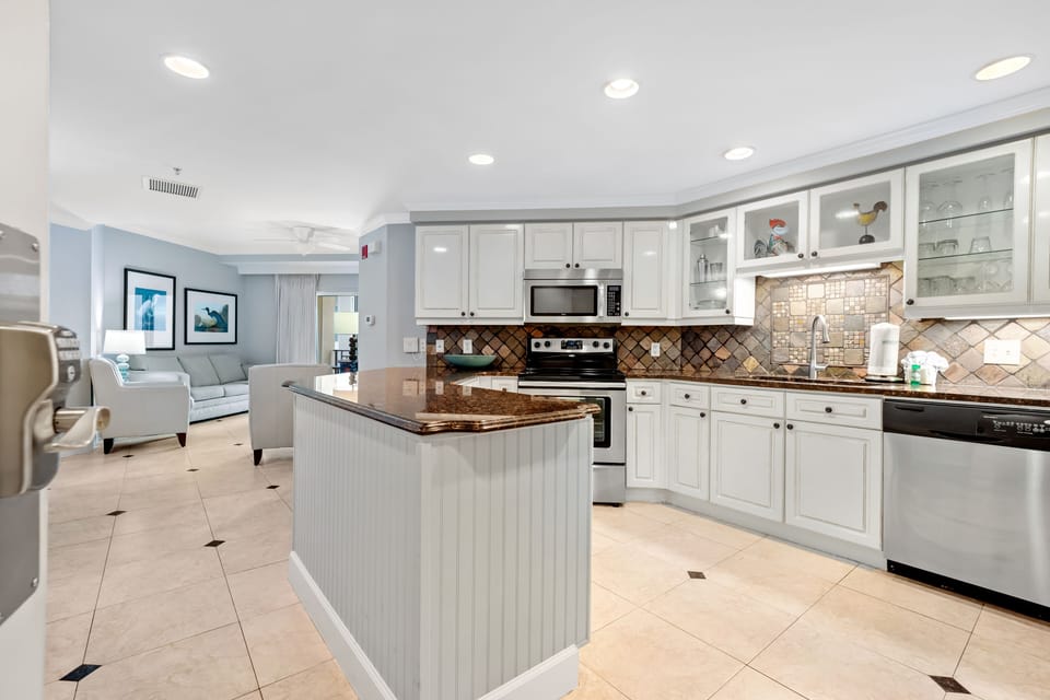 spacious kitchen - everything you need to cook and refrigerator with ice maker; standard coffee pot