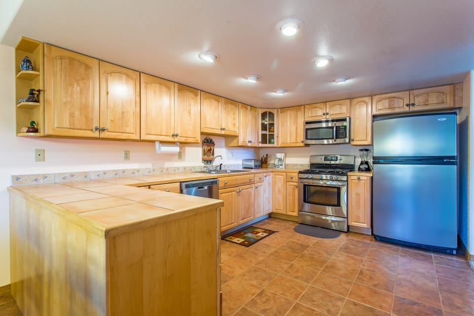 Spacious modern kitchen with updated stainless steel appliances
