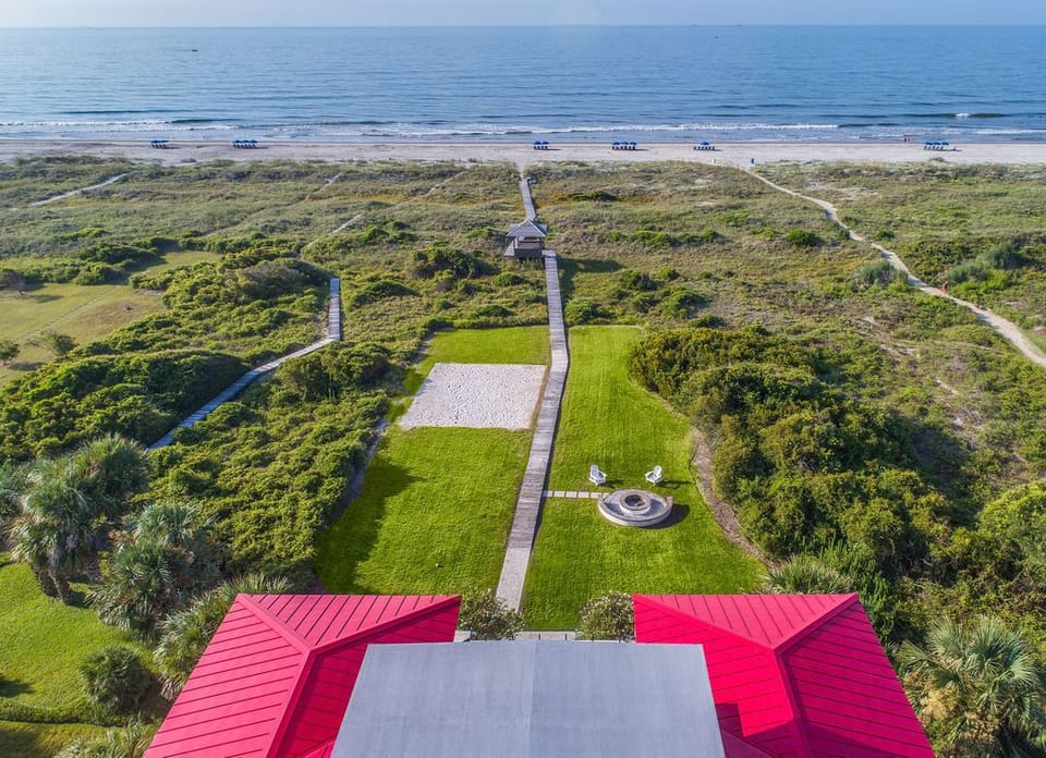 Unbeatable Oceanfront Location – Aerial view of Sea Star with private beach walkway and panoramic Atlantic views.