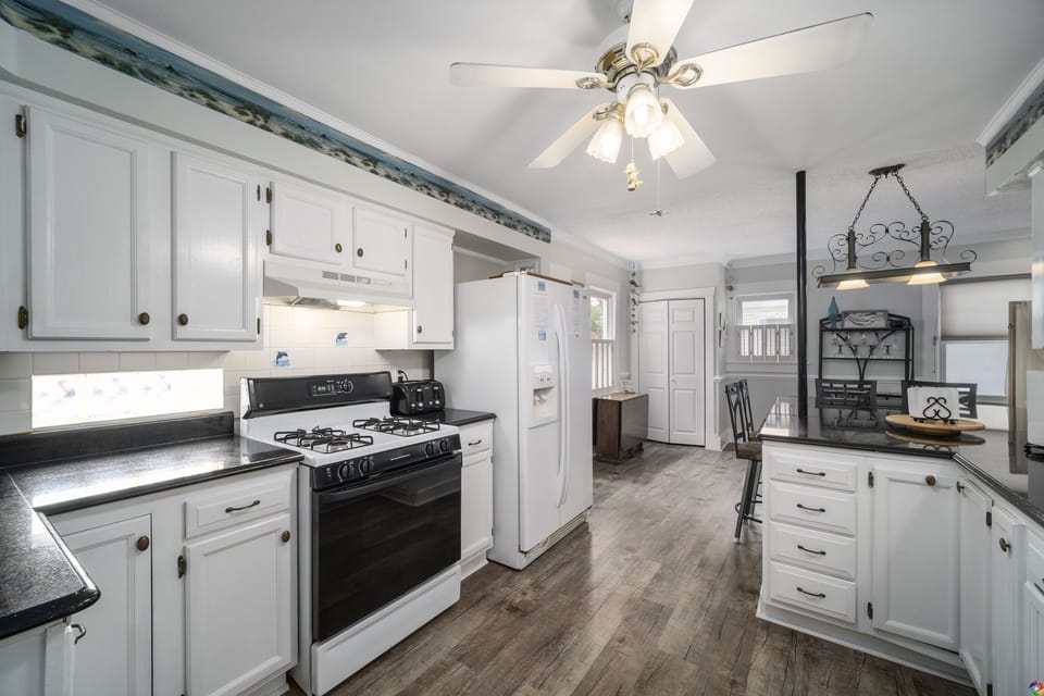 Kitchen with natural gas stove and oven