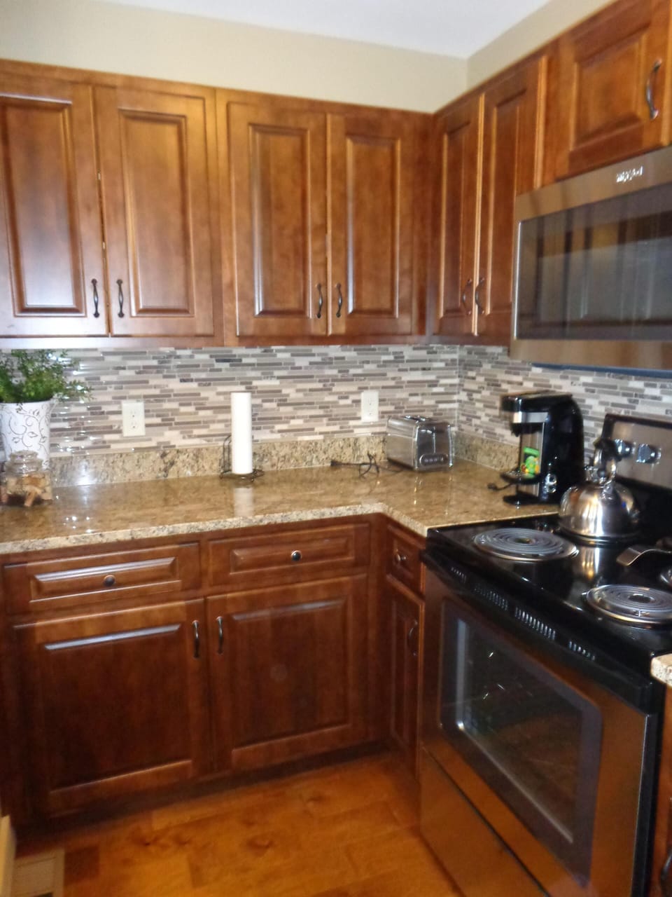 Updated Kitchen with Stainless Steel Appliances and granite counter tops