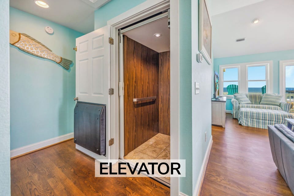Surf or Sound Realty - 867 - Caribbean Paradise - Elevator - Label
