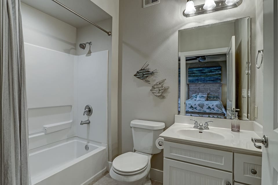 Private bath in the second bedroom.