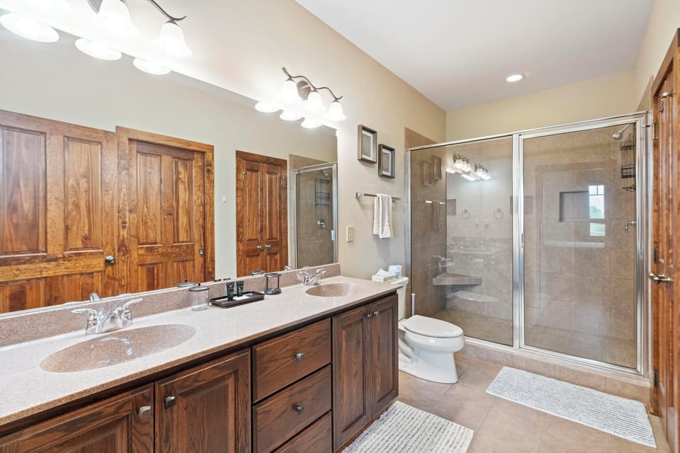 Primary Bathroom--- Double Sinks and Shower Stall