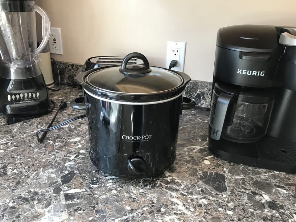 Dual-purpose Keurig uses pods or grounds (provided): crockpot and baking pans.