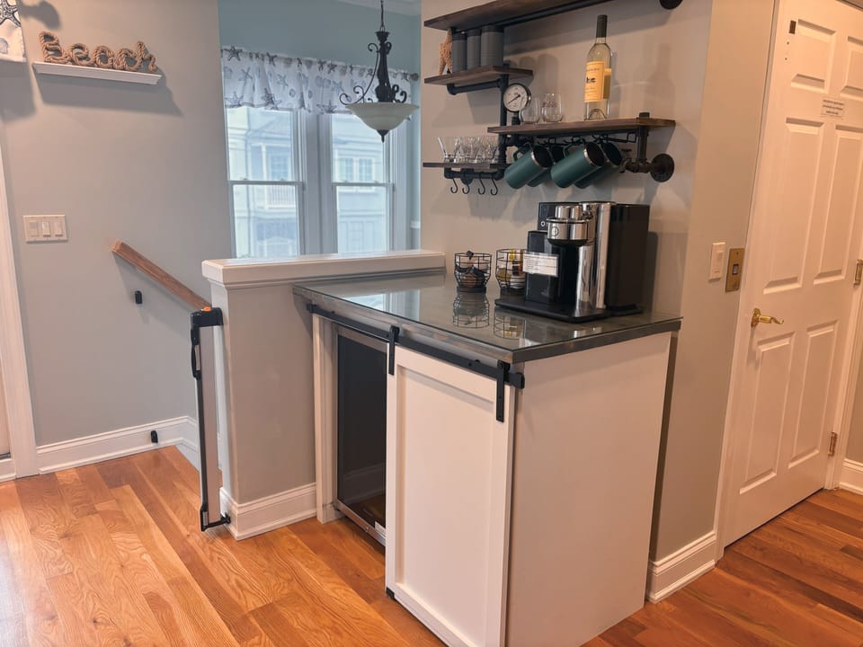 Custom bar with drink machine & complementary drink pods