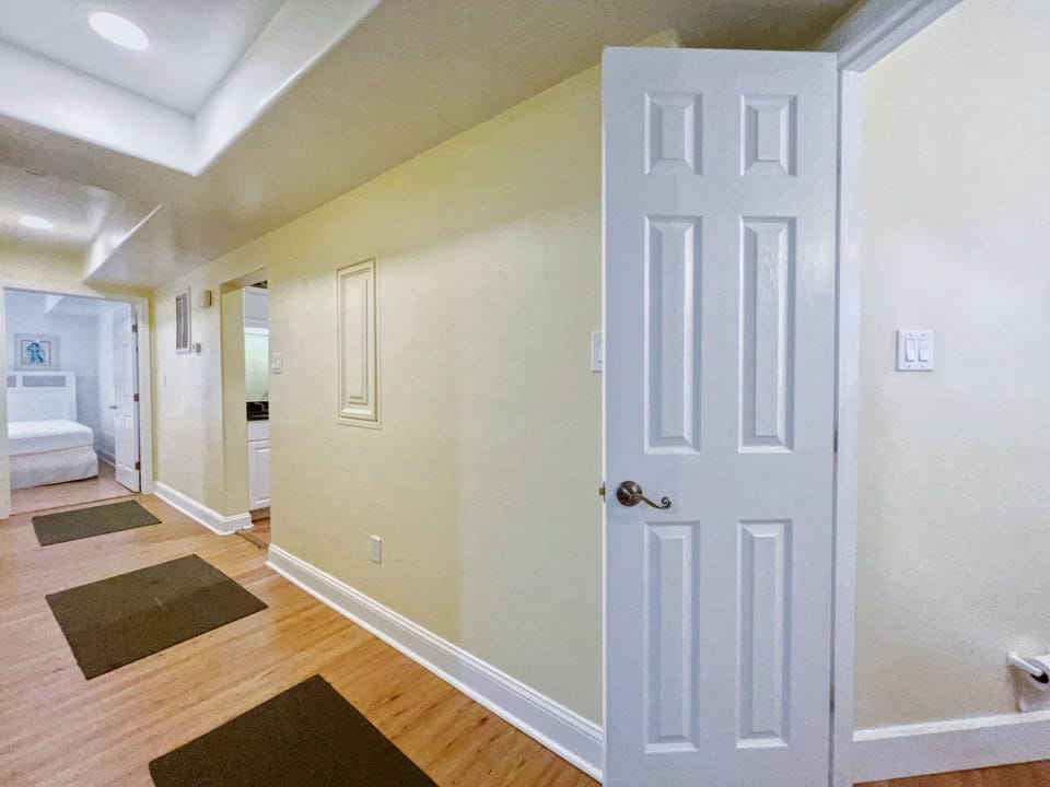 Hallway to Bedrooms & Kitchen