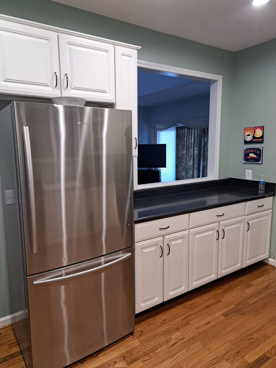 Kitchen looking into living room