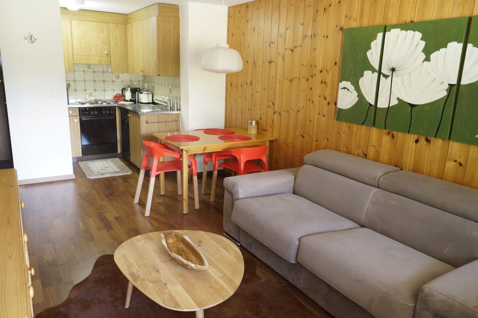 The eating area as well as the kitchenette.