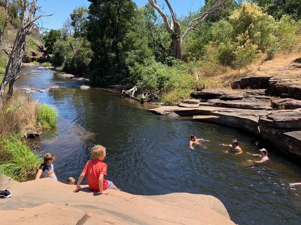 Swimming off the rocks "black hole" locals favourite (10min walk)