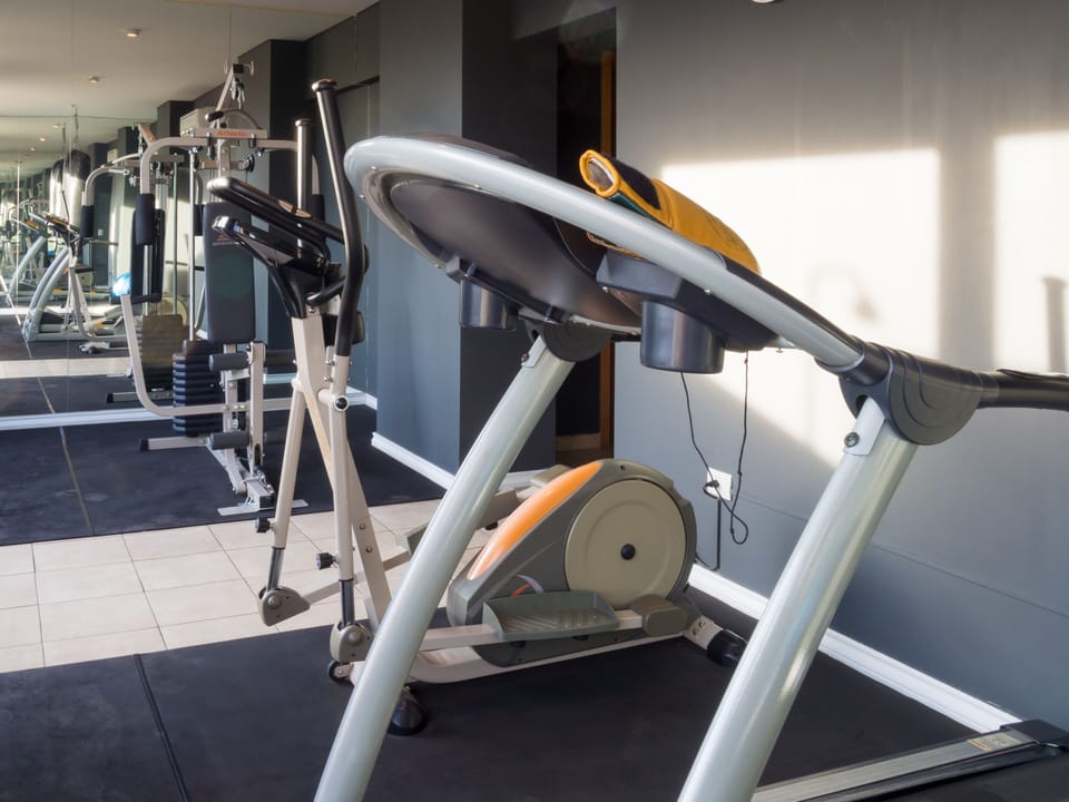 Keep up a workout indoors with several cardio and strength machines in the fitness room.