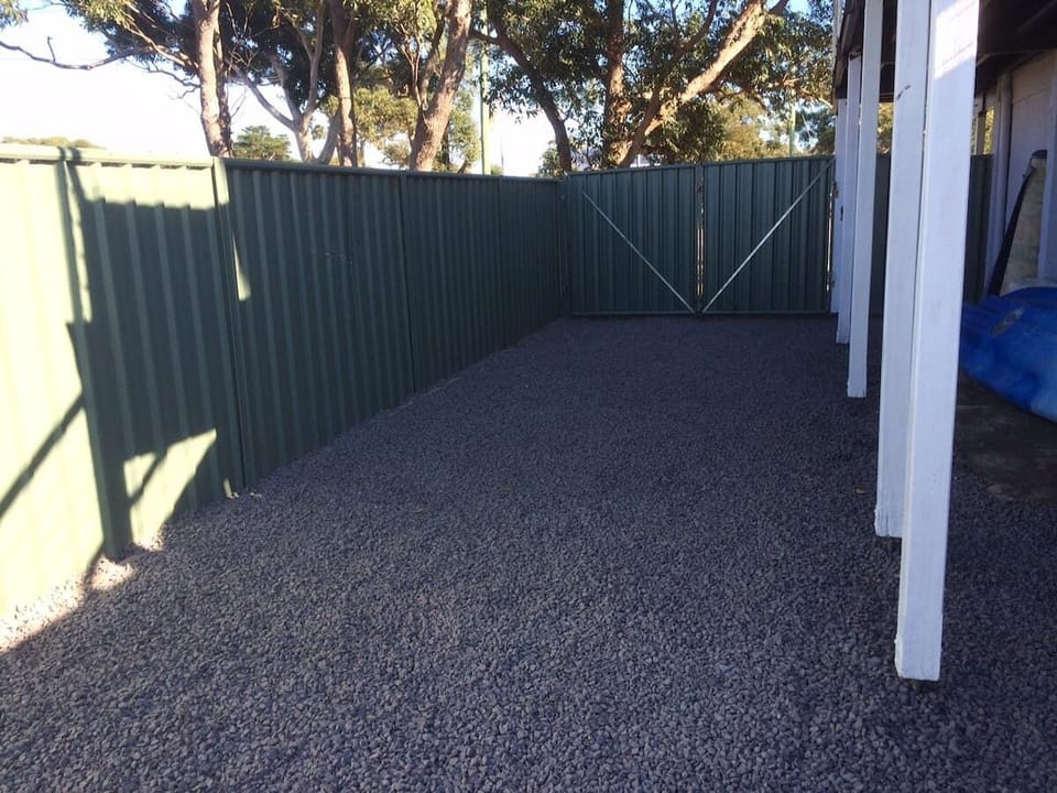 Secure parking down the side of the house