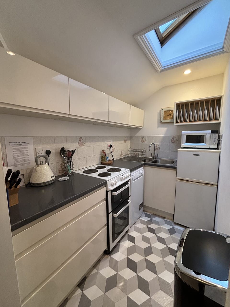 The compact well equipped kitchen.