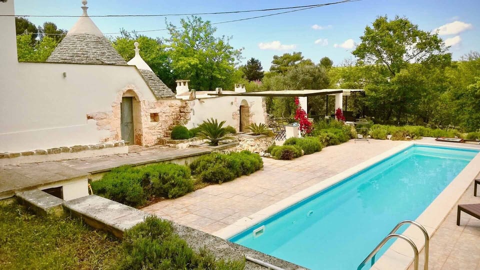 View of Pool, Trullo and new covered dining are.
