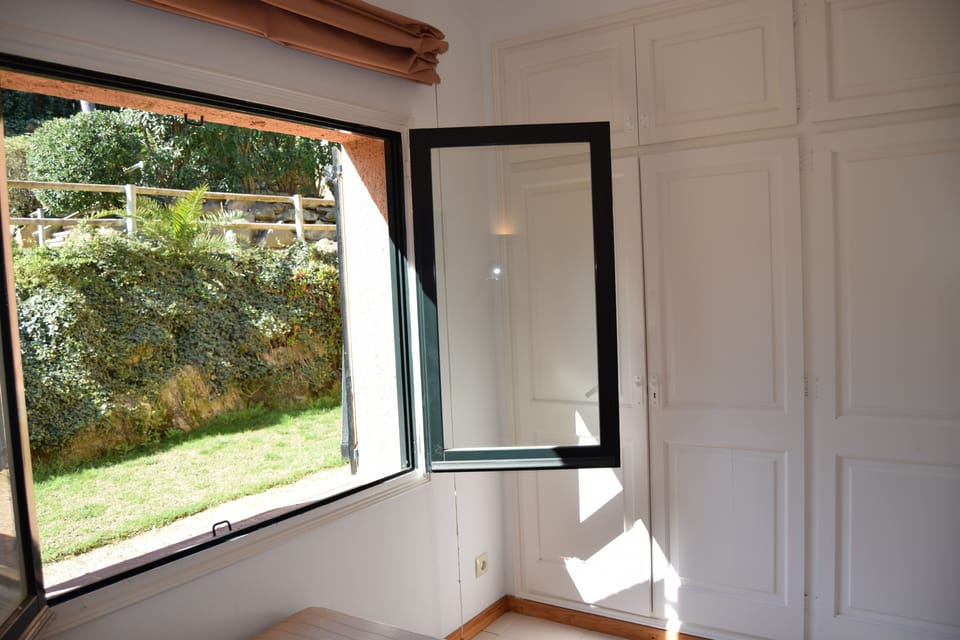 double bedroom with garden views-SA PUNTA COSTA BRAVA