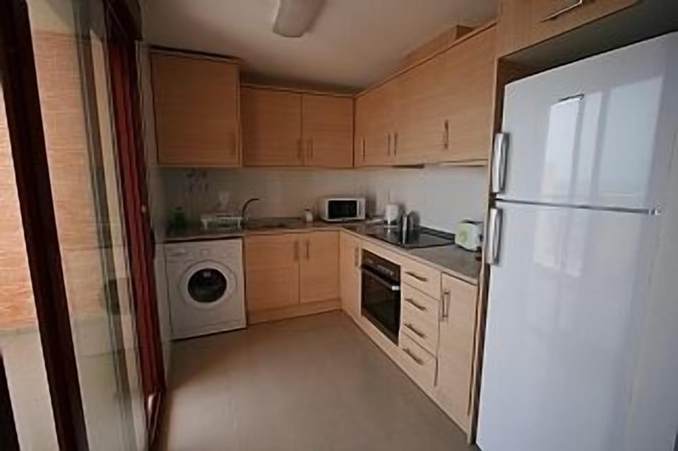 Kitchen with door to the terrace