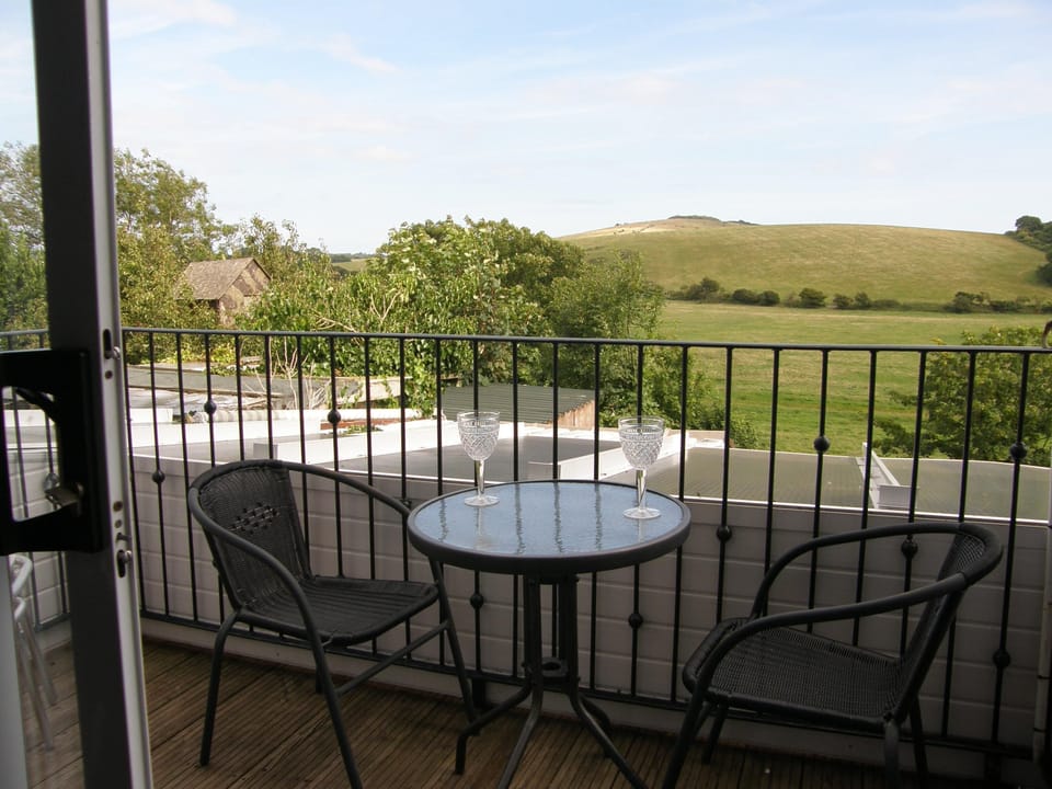 East-facing Balcony. To enjoy a sunny breakfast or shady evening relax. Seats 4