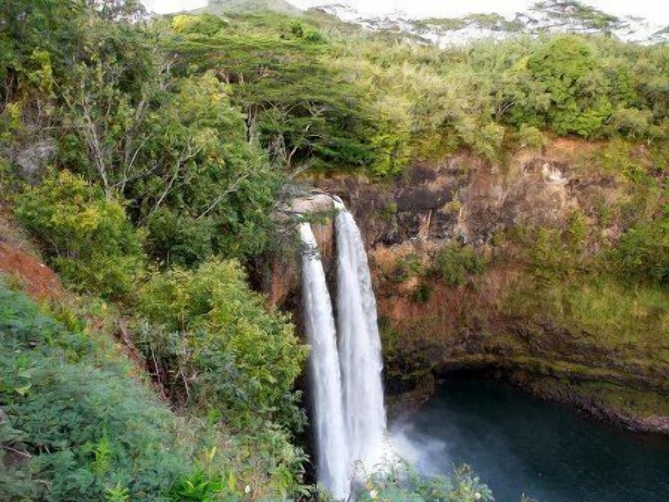 Nearby Wailua Waterfall. Reach this lookout by car or hike to the pool below.