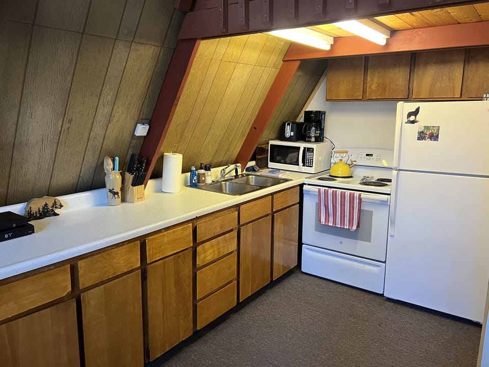 Well stocked kitchen with full-sized appliances.