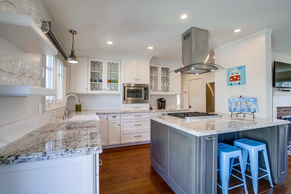 Updated and fully-stocked kitchen.