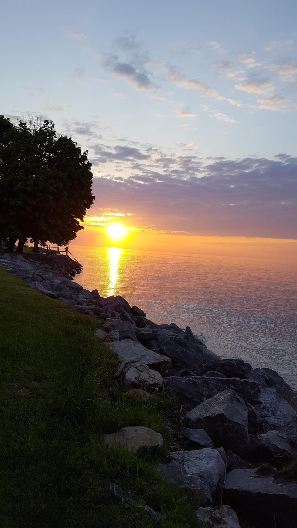 beautiful sunset looking west from the shoreline
