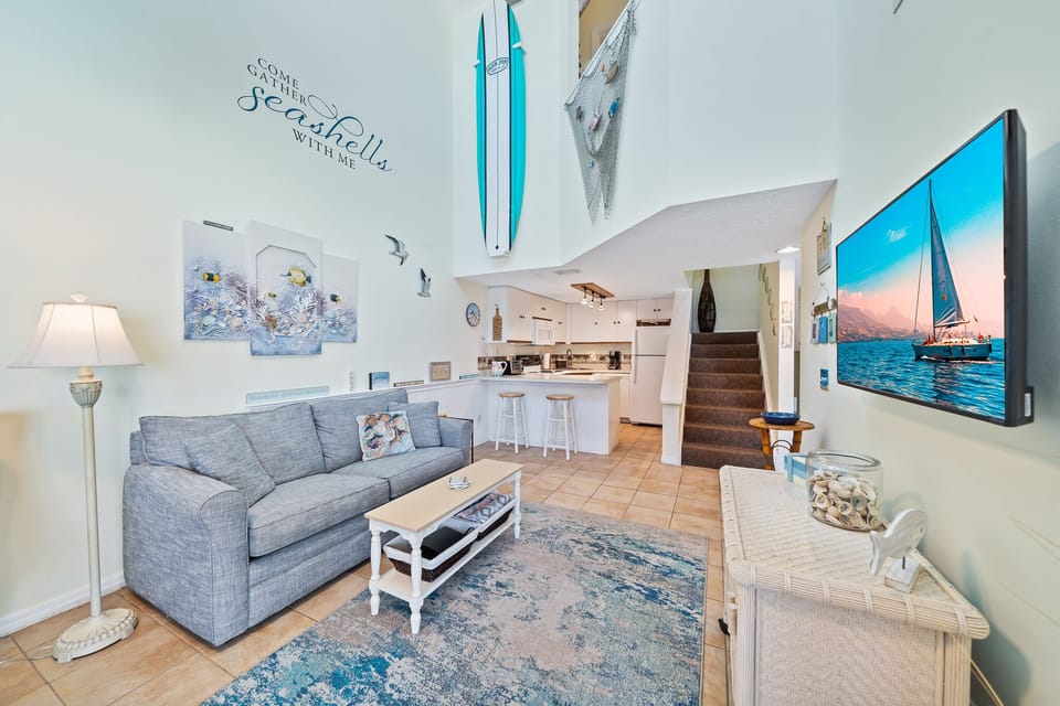 Spacious, bright, open concept living area.