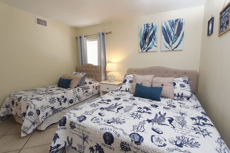 Guest Bedroom Features 1 Queen Bed and 1 Twin Bed