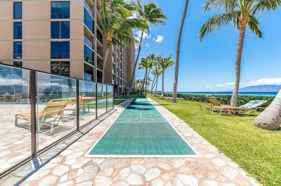 Enjoy a fun game of shuffleboard with stunning ocean views